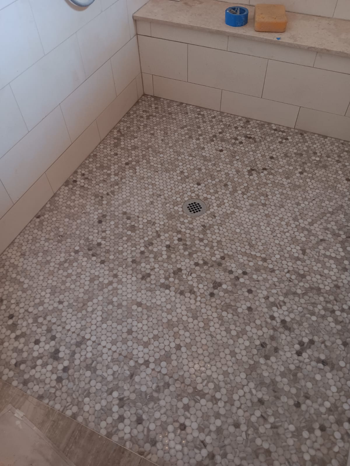 Completed master bathroom with stacked stone accent wall